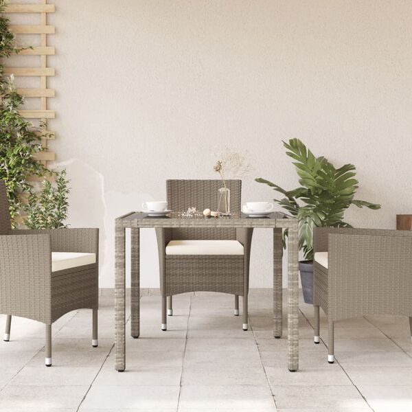 vidaXL Table de jardin avec dessus en verre gris clair résine tressée