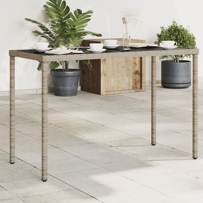 vidaXL Table de jardin dessus en verre gris 115x54x74cm résine tressée